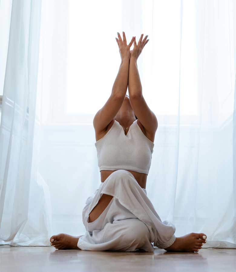 A women doing a yoga pose